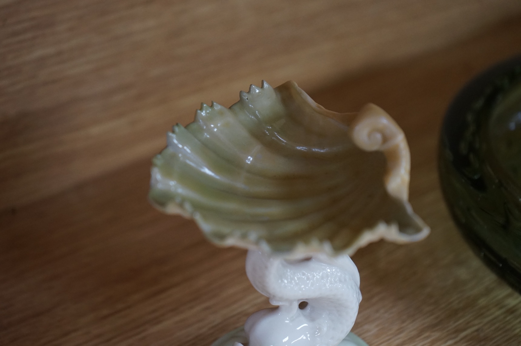 A Worcester butterfly handled cup and saucer and four other items, together with Royal Crown Derby, Dresden and Coalport items. (9). Tallest 13 cm